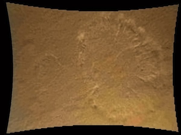 Снимка, която показва разпръскването на прах, докато Curiosity се готви да се приземи на Марс. Снимка: NASA/Reuters