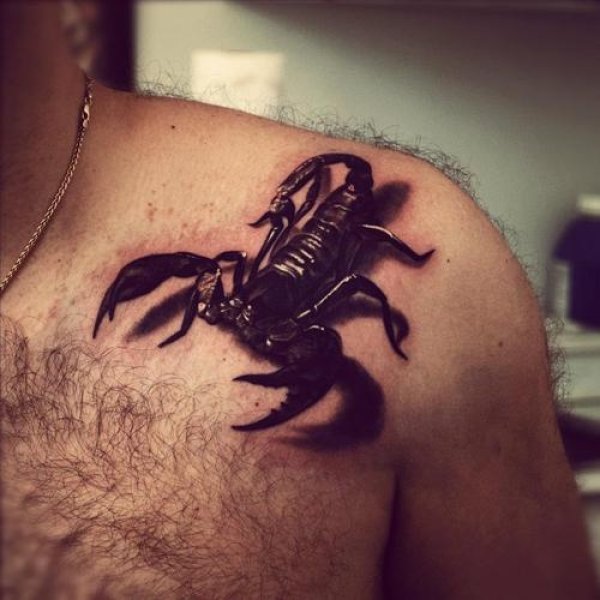 Скорпионът изглежда като жив. Снимка: blog.tattoodo.com