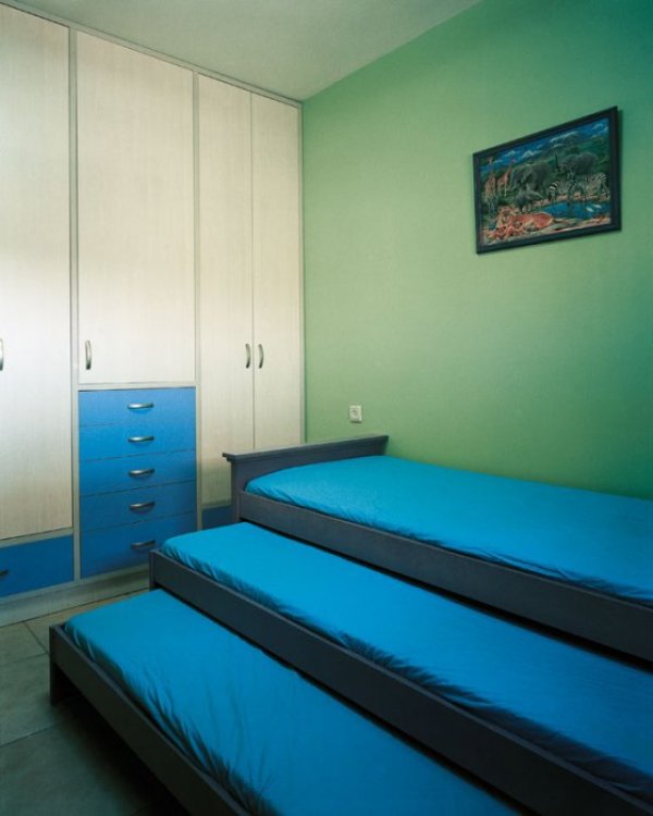 Стаята на 9-годишно момче от Западния бряг. Снимка: James Mollison